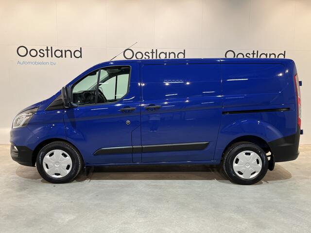 Ford TRANSIT CUSTOM 280 2.0 TDCI L1H1 Trend 130 PK Automaat / Euro 6 / Schuifdeur L + R / Airco / CarPlay / Cruise Control Adap. / Trekhaak / Navigatie / 3-Zits