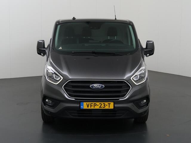 Ford TRANSIT CUSTOM 300 | 2.0 TDCI | Aut. | L2 H1 | Limited | Adaptive Cruise | Stoelverwarming | LM Velgen | 3-zits | Trekhaak | Navigatie | Parkeercamera | Apple Carplay