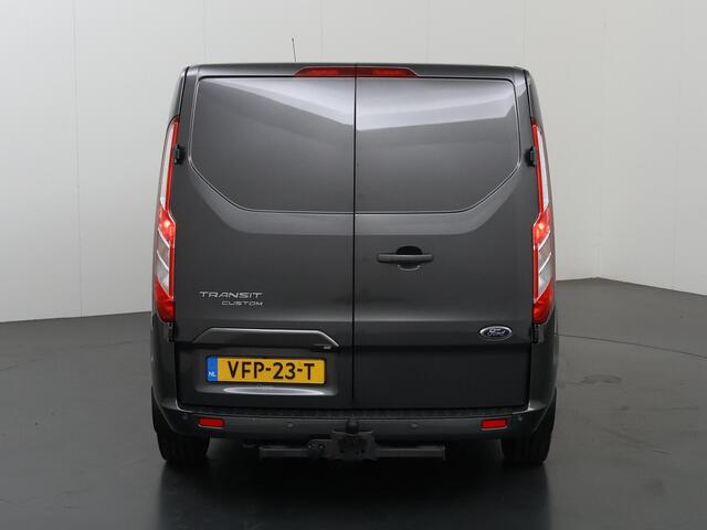 Ford TRANSIT CUSTOM 300 | 2.0 TDCI | Aut. | L2 H1 | Limited | Adaptive Cruise | Stoelverwarming | LM Velgen | 3-zits | Trekhaak | Navigatie | Parkeercamera | Apple Carplay