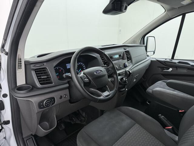 Ford TRANSIT CUSTOM 340 2.0TDCI 130PK L2H1 Sortimo Inperiaal+Ladder Trekhaak Cruise Control Airco Stoelverwarming Pdc Trend Betonplex Vloer Wandbetimmering Inbouwkasten Led