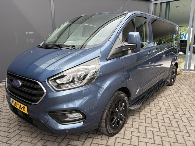 Ford TRANSIT CUSTOM 320 2.0 TDCI L2H1 Platinum Edition DC Automaat Achteruitrijcamera - Parkeersensoren - Navigatie - Airco - Dodehoek detector - Cruise control - Licht metalen velgen 16 inch - Lederen bekleding - Radio - Bluetooth - Dubbele cabine - Tussens - Mistlampen voo