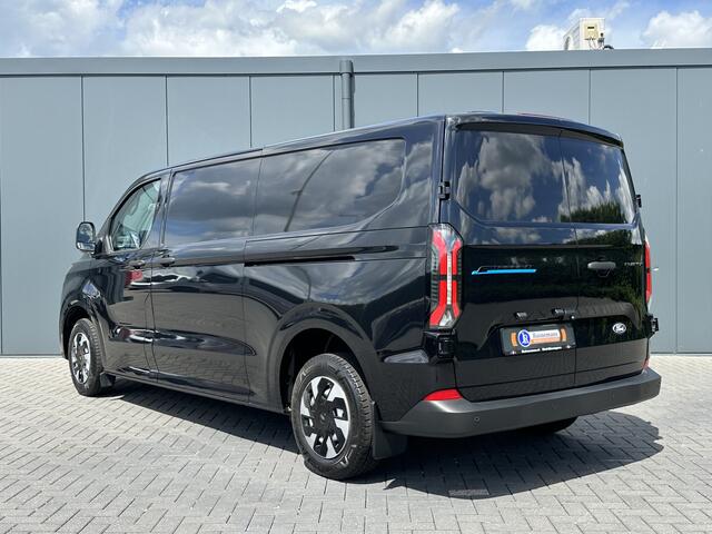 Ford TRANSIT CUSTOM E-Transit 71 kWh FULL ELECTRIC / L2H1 / ** NIEUW ** / 2.057 KM / 2x ELEKTRISCHE SCHUIFDEUREN / CAMERA / ECC / CRUISE / CARPLAY