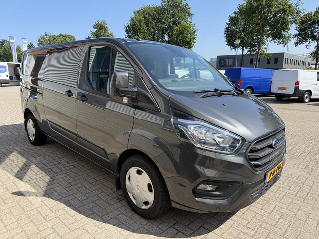 Ford TRANSIT CUSTOM 320 2.0 TDCI automaat L2H1 Trend / 3 persoons / vaste prijs rijklaar ¤ 17.950 ex btw / lease vanaf ¤ 302 / trekhaak / laadruimte gestoffeerd / airco / cruise / magneic grey metallic