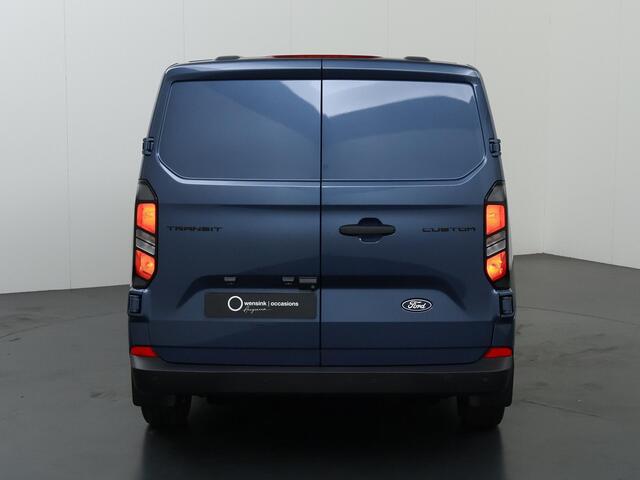 Ford TRANSIT CUSTOM 320 | 2.0 TDCI | L2 H1 | TREND | PARKEERCAMERA | APPLE CARPLAY | ANDROID AUTO | 3-ZITS | CLIMATE CONTROL | VOORRUITVERWARMING | CRUISE CONTROL | METALLIC LAK CHROME BLUE