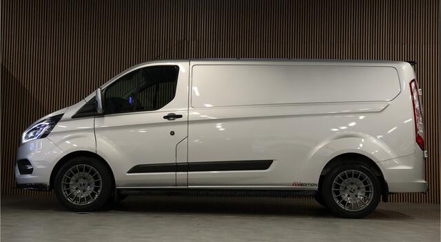 Ford TRANSIT CUSTOM 320 2.0 TDCI L2H1 Raptor Edition | Bi-Xenon | CarPlay | Navigatie | Camera | Stoelverwarming | Dodehoek detector | Lane Assist | DAB | 3-Zitter | Dealer onderhouden | Nieuwe APK
