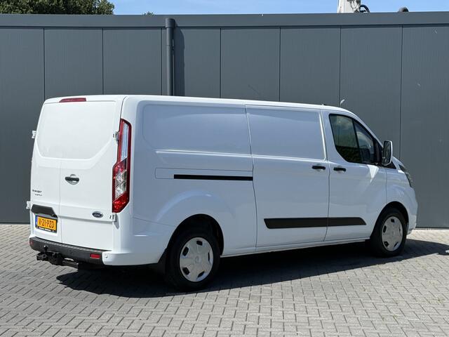 Ford TRANSIT CUSTOM 2.0 TDCI 130 PK / L2H1 / AUTOMAAT / TREKHAAK / AIRCO / CRUISE / CAMERA / 3-ZITS / LED / STOEL -EN VOORRUIT VERWARMING