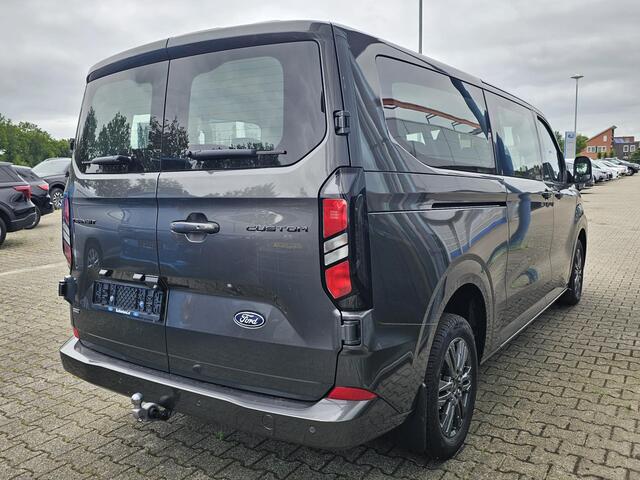 Ford TRANSIT CUSTOM 340 2.5 PHEV L2H1 Limited 233pk | Kombi | Incl. BTW/BPM | Dubbele zijschuifdeur | Privacy Glass | Inklapbare trekhaak | Verwarmbare bijrijdersbank | 17 inch lichtmetalen velgen | Driver Assistance Pack Premium | Verwarmbaar stuurwiel