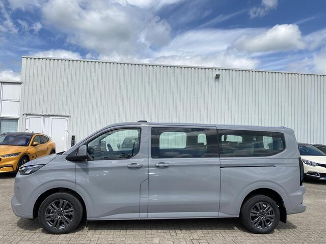 Ford TRANSIT CUSTOM 340 2.5 PHEV L2H1 Limited 233pk | Kombi | Incl. BTW/BPM | Dubbele zijschuifdeur | Privacy Glass | Inklapbare trekhaak | Verwarmbare bijrijdersbank | 17 inch lichtmetalen velgen | Driver Assistance Pack Premium | Verwarmbaar stuurwiel