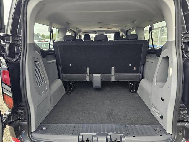 Ford TRANSIT CUSTOM 340 2.5 PHEV L2H1 Limited 233pk | Kombi | Incl. BTW/BPM | Dubbele zijschuifdeur | Privacy Glass | Inklapbare trekhaak | Verwarmbare bijrijdersbank | 17 inch lichtmetalen velgen | Driver Assistance Pack Premium | Verwarmbaar stuurwiel