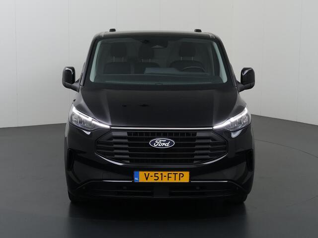 Ford TRANSIT CUSTOM 320 2.0 TDCI | 136 PK | LIMITED | L2 H1 | ADAPTIVE CRUISE | 3-ZITS | PARKEERCAMERA | NAVIGATIE | APPLE CARPLAY / ANDROID AUTO | 17" LM VELGEN | STOELVERWARMING | STUURVERWARMING | LAADRUIMTE BETIMMERING