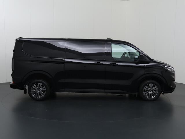 Ford TRANSIT CUSTOM 320 2.0 TDCI | 136 PK | LIMITED | L2 H1 | ADAPTIVE CRUISE | 3-ZITS | PARKEERCAMERA | NAVIGATIE | APPLE CARPLAY / ANDROID AUTO | 17" LM VELGEN | STOELVERWARMING | STUURVERWARMING | LAADRUIMTE BETIMMERING