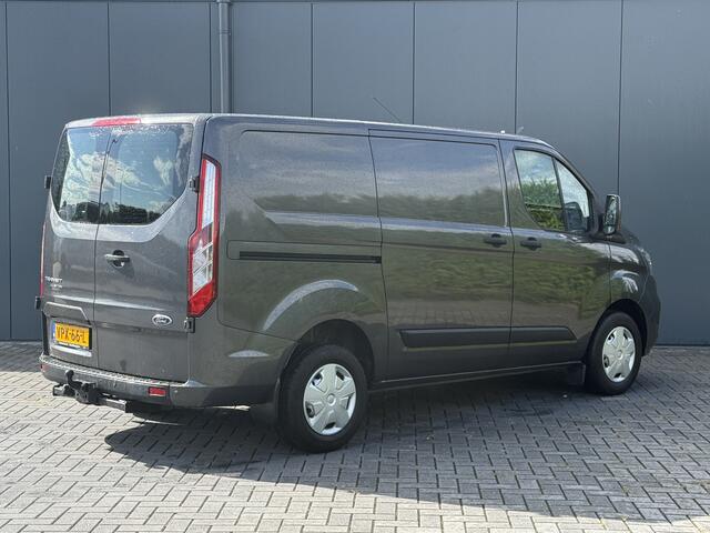 Ford TRANSIT CUSTOM 2.0 TDCI / L1H1 / 1e EIG. / AIRCO / CRUISE / NAVI / LED / 2.5 TONS TREKHAAK / 3-ZITS / PDC