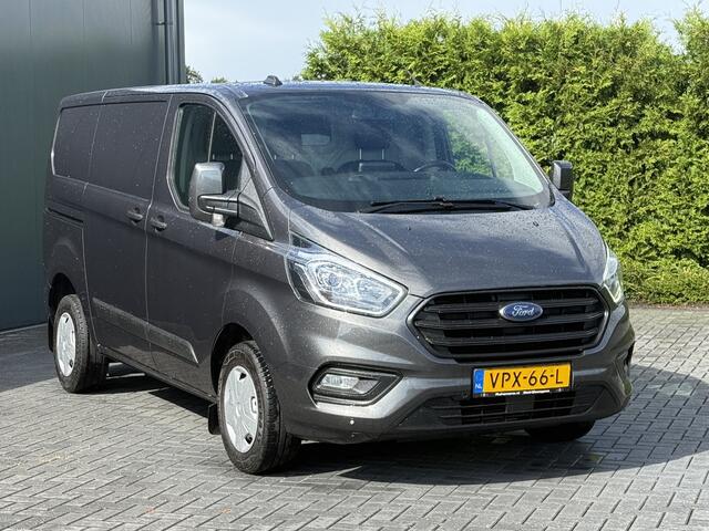 Ford TRANSIT CUSTOM 2.0 TDCI / L1H1 / 1e EIG. / AIRCO / CRUISE / NAVI / LED / 2.5 TONS TREKHAAK / 3-ZITS / PDC