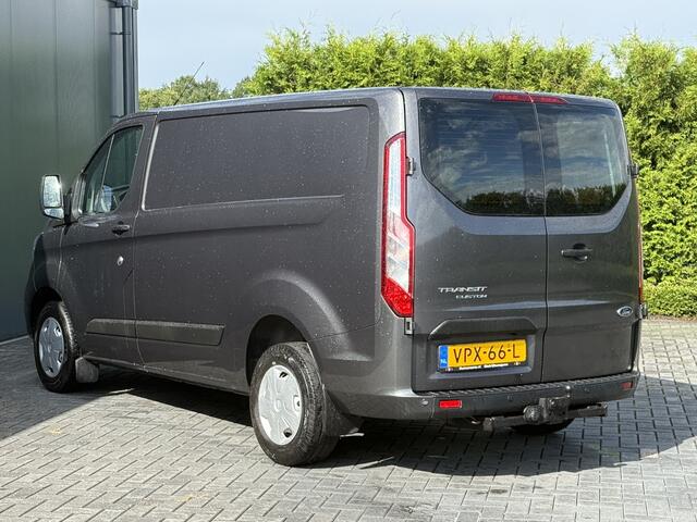 Ford TRANSIT CUSTOM 2.0 TDCI / L1H1 / 1e EIG. / AIRCO / CRUISE / NAVI / LED / 2.5 TONS TREKHAAK / 3-ZITS / PDC