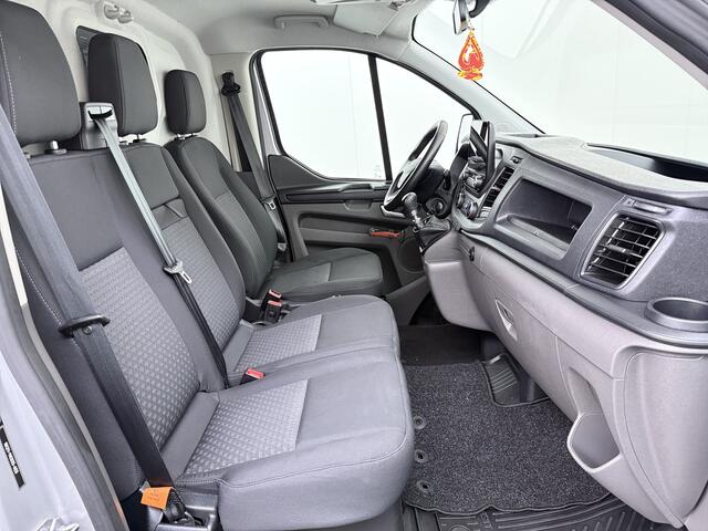 Ford TRANSIT CUSTOM 280 2.0TDCI 130PK Euro 6 L1H1 3-Persoons Navi Airco Cruise Control Bluetooth DAB Pdc Trend Betonplex Vloer Wandbetimmering Schuifdeur+Raam Achterdeuren+Ramen 1e Eigenaar