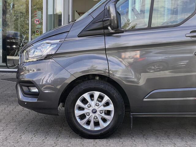 Ford TRANSIT CUSTOM 320 2.0 TDCI L2H1 Limited DC | 125.000 KM | Betimmerde Laadruimte | Navigatie | Adaptieve Cruise Control | Stoelverwarming |
