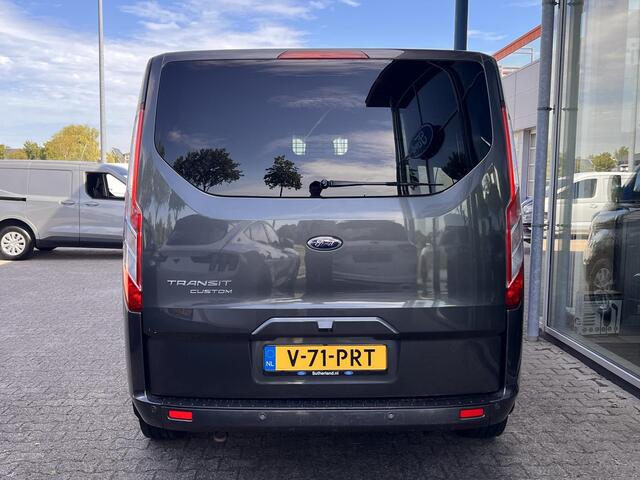Ford TRANSIT CUSTOM 320 2.0 TDCI L2H1 Limited DC | 125.000 KM | Betimmerde Laadruimte | Navigatie | Adaptieve Cruise Control | Stoelverwarming |