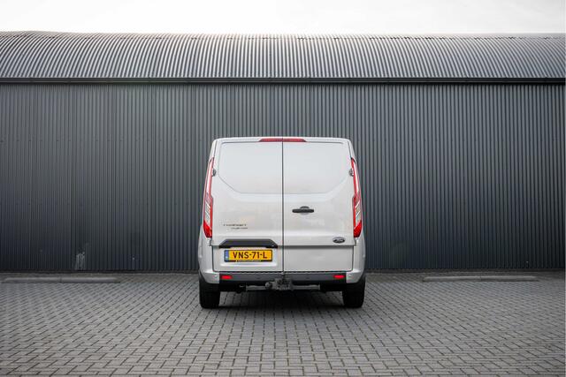 Ford TRANSIT CUSTOM 2.0 EcoBlue L1H1 | Automaat | 1e Eigenaar | Limited | Camera | Cruise | PDC | Airco | Trekhaak