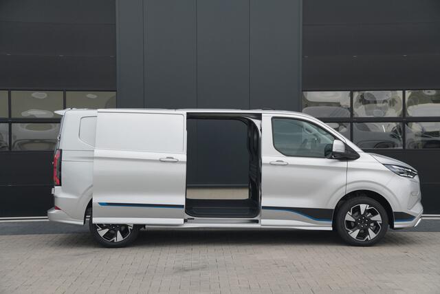 Ford TRANSIT CUSTOM E-Transit 340 L2H1 Sport 71 kWh 218pk - 2x Schuif - ACC - B&O - Navi - Stoel/Stuurverwarming - 360 Camera - Trekhaak - Rijklaar