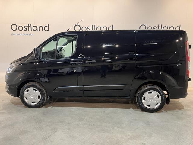 Ford TRANSIT CUSTOM 300 2.0 TDCI L1H1 Trend 130 PK Automaat / Euro 6 / Schuifdeur L + R / Airco / CarPlay / Cruise Control Adap. / Trekhaak / Xenon / Navigatie / 3-Zits / 27.300 KM !!