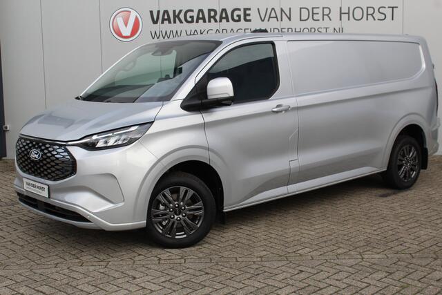 Ford TRANSIT CUSTOM E-Transit 340 L2H1 Limited 71 kWh. Vol elektrisch ! De nieuwe E-Transit Custom is klaar voor de toekomst ! Airco, navigatie, telefoonvoorb., 17" LM wln (meerprijs), 3-zits, camera, parkeersensoren, LED verl., stoel-, stuur-, spiegel- en voorraamverwarming etc.