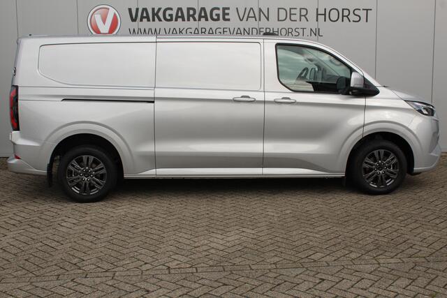 Ford TRANSIT CUSTOM E-Transit 340 L2H1 Limited 71 kWh. Vol elektrisch ! De nieuwe E-Transit Custom is klaar voor de toekomst ! Airco, navigatie, telefoonvoorb., 17" LM wln (meerprijs), 3-zits, camera, parkeersensoren, LED verl., stoel-, stuur-, spiegel- en voorraamverwarming etc.
