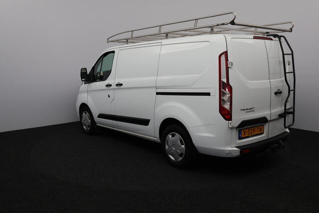 Ford TRANSIT CUSTOM 280 2.0 TDCI L1H1 Trend/ D-Riem verv: 144.000 Km!/ Trekhaak/ Automaat!/ Apple Carplay/ DAB+/ Voorruitverw./ Stoelverw./ PDC V+A/ Navi/ Clima/ Cruise/ Elek. pakket/ Bluetooht/ Multi. LEDER. Stuur/ PDC V+A.