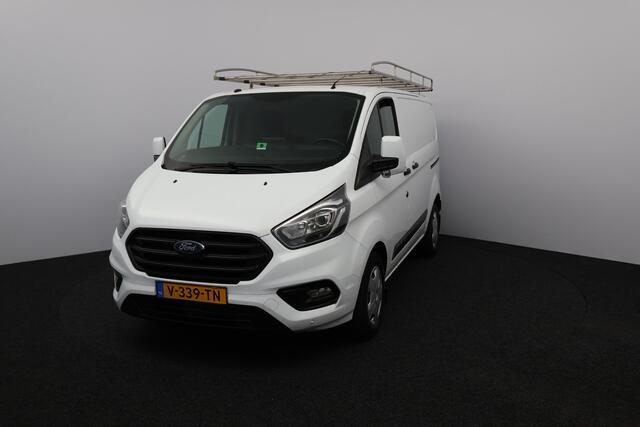 Ford TRANSIT CUSTOM 280 2.0 TDCI L1H1 Trend/ D-Riem verv: 144.000 Km!/ Trekhaak/ Automaat!/ Apple Carplay/ DAB+/ Voorruitverw./ Stoelverw./ PDC V+A/ Navi/ Clima/ Cruise/ Elek. pakket/ Bluetooht/ Multi. LEDER. Stuur/ PDC V+A.