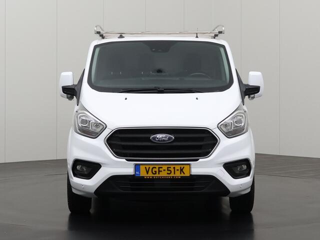 Ford TRANSIT CUSTOM 2.0TDCI 130PK Lang Limited | Imperiaal | Trekhaak | Navigatie | Camera | Multimedia | Airco | Cruise | 3-Zits | Betimmering