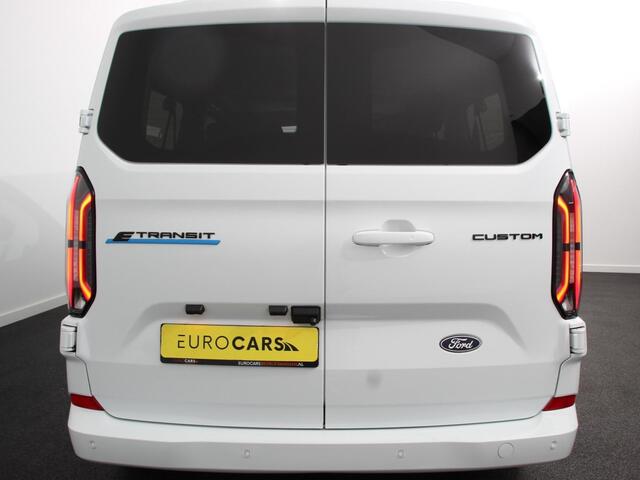 Ford TRANSIT CUSTOM e-Transit 340 L2H1 Limited 65 kWh 8 persoons Adaptieve cruise control Airco Lichtmetalen Velgen Extra getint glas Camera Navigatie Apple Carplay/ Android Auto