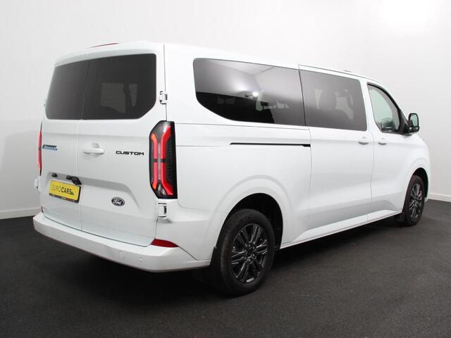 Ford TRANSIT CUSTOM e-Transit 340 L2H1 Limited 65 kWh 8 persoons Adaptieve cruise control Airco Lichtmetalen Velgen Extra getint glas Camera Navigatie Apple Carplay/ Android Auto