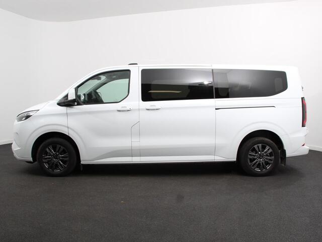 Ford TRANSIT CUSTOM e-Transit 340 L2H1 Limited 65 kWh 8 persoons Adaptieve cruise control Airco Lichtmetalen Velgen Extra getint glas Camera Navigatie Apple Carplay/ Android Auto