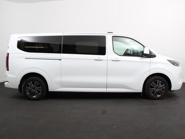 Ford TRANSIT CUSTOM e-Transit 340 L2H1 Limited 65 kWh 8 persoons Adaptieve cruise control Airco Lichtmetalen Velgen Extra getint glas Camera Navigatie Apple Carplay/ Android Auto