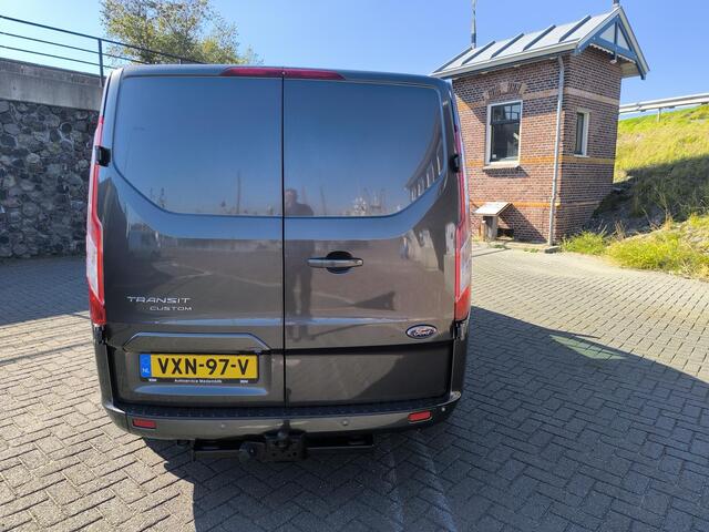 Ford TRANSIT CUSTOM 320 2.0 TDCI L1H1 Limited 130PK euro6, Stoel verwarming, carplay, trekhaak, LM velgen, airco en cruise control, nette bedrijfs bus rook vrij.