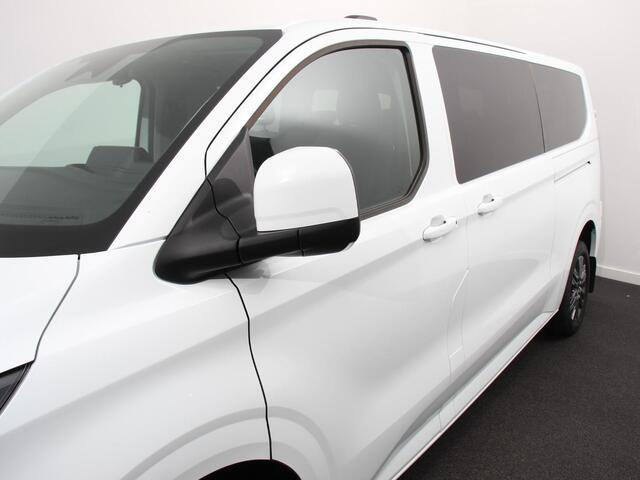 Ford TRANSIT CUSTOM 340 2.5 Automaat PHEV L2H1 Limited 9 PERS Navigatie Apple CarPlay Android Auto Camera Parkeerhulp Adaptive Cruise Control Dodehoekdetectie Stoel- en stuurverwarming Full Led Climate Control Lichtmetalen velgen