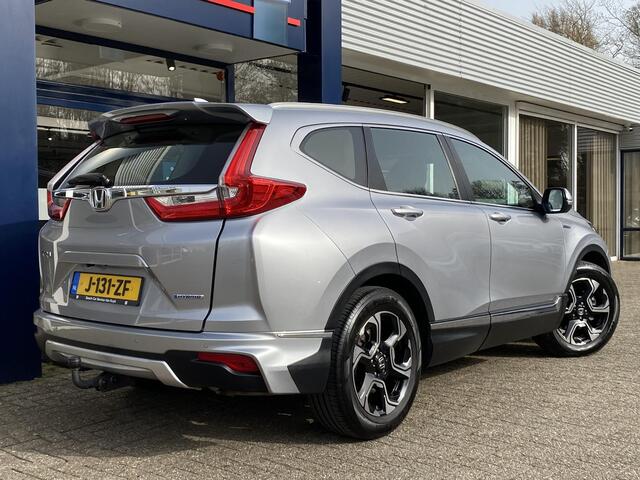 Honda CR-V 2.0 Hybrid Business Edition / Automaat / NL-Auto / Adaptieve Cruise-Control / Stoelverwarming / Trekhaak / Climate-Control / Apple-Carplay & Android-Auto / DAB Radio-Bluetooth / Navi / PDC V+A met Camera / 18'' LMV / ENZ.