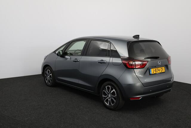 Honda JAZZ 1.5 e:HEV Executive/ LED Koplampen/ Camera/ Apple + Android/ DAB+/ Stoelverw./ Lane-Assist./ Adaptive Cruise/ Dode-Hoek DET./ Keyless/ Navi/ Multi. LEDER. Stuur/ PDC V+A/ Extra getint glas.