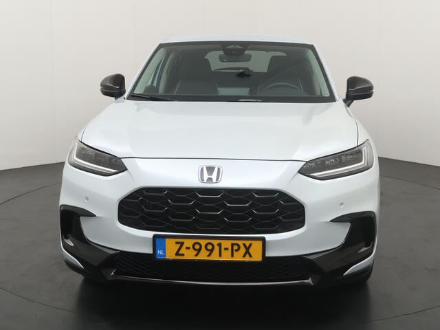Honda ZR-V 2.0 184PK HEV Sport | Elekt. stoel | Adapt. cruise | Stoelverwarming | Clima | Elekt. kofferklep | Halfleder/stof | Keyless