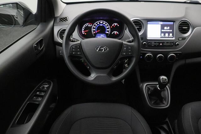 Hyundai I 10 1.0i Comfort 2019 | 1e Eigenaar | Navigatie | Carplay | DAB+ Radio | Cruise Control | Stuurwiel Bediening | Boekjes | 2 Sleutels | Elektrische Ramen | Lichtmetalen Velgen | Nationale Autopas