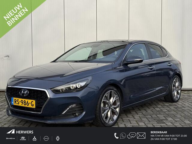 Hyundai I 30 Fastback 1.4 T-GDI Premium / Lederen Bekleding / Panorama Dak / Trekhaak / 18" met all season / Navigatie / Electrisch verstelbare bestuurderstoel met geheugen /