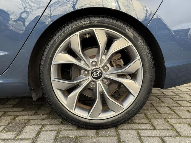 Hyundai I 30 Fastback 1.4 T-GDI Premium / Lederen Bekleding / Panorama Dak / Trekhaak / 18" met all season / Navigatie / Electrisch verstelbare bestuurderstoel met geheugen /