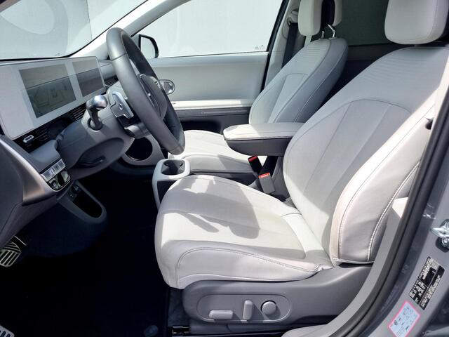 Hyundai IONIQ 5 Lounge 77.4 kWh Automaat / 1600KG Trekgewicht / Lederen Bekleding / HUD / Cruise Control Adaptief / Elektr. Achterklep / Dodehoekdetectie / Stoelverwarming / Stuurverwarming
