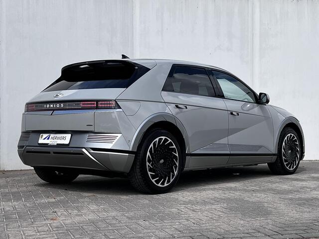 Hyundai IONIQ 5 Lounge AWD 77.4 kWh automaat / Dealer onderhouden / Relax Pakket / weinig km / HUD / Camera 360° / Leder / Elektrische stoelen en klep / 20" LM wielen /