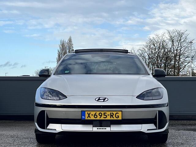 Hyundai IONIQ 6 First Edition AWD 77.4 kWh 325PK | Panorama schuifkanteldak | 800 V snellaadsysteem 10-80% in ca. 18 minuten | 20? lichtmetalen velgen & matzwarte designaccenten | BOSE premium audiosysteem | Premium interieur |