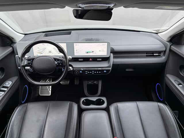 Hyundai IONIQ 5 Lounge 73kWh Automaat / Accu SOH 100% / Fabrieksgarantie tot 9-2026 / Dealer onderhouden / WLTP 451 km / 1.600 kg Trekgewicht / Elektrische klep en stoelen / Stuur-, stoel- en achterbankverwarming /