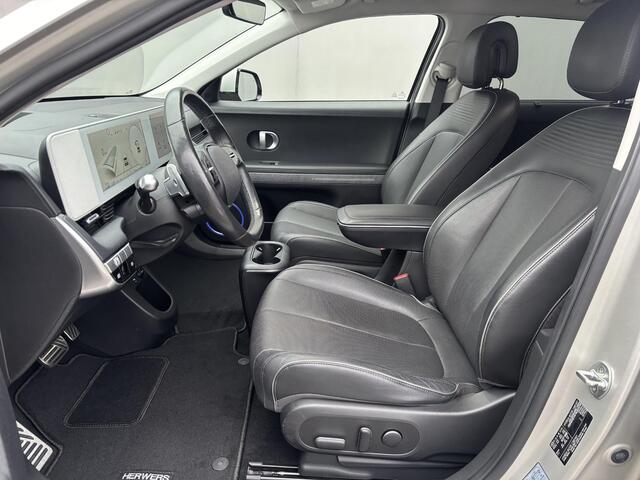 Hyundai IONIQ 5 Lounge 73kWh Automaat / Accu SOH 100% / Fabrieksgarantie tot 9-2026 / Dealer onderhouden / WLTP 451 km / 1.600 kg Trekgewicht / Elektrische klep en stoelen / Stuur-, stoel- en achterbankverwarming /