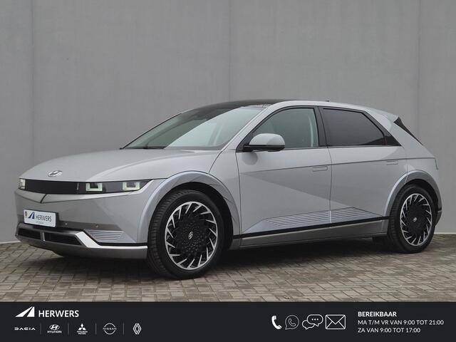 Hyundai IONIQ 5 Lounge 73kWh Automaat / Accu SOH 100% / Fabrieksgarantie tot 10-2026 / Dealer onderhouden / Panoramadak / WLTP 451 km / Afn. trekhaak 1.600 kg / Elektrische klep en stoelen / Stuur-, stoel- en achterbankverwarming /