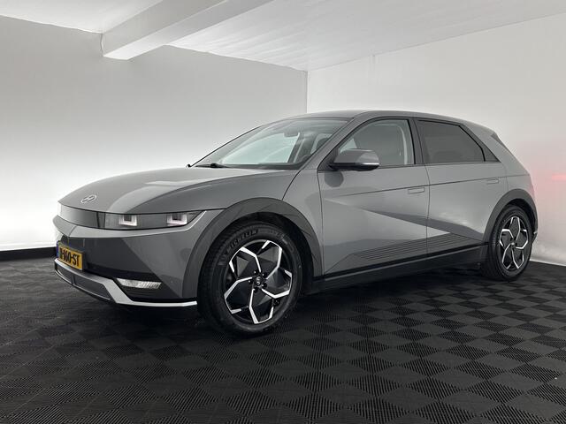 Hyundai IONIQ 5 Connect 73kWh [ 3-Fase ] {SOH-100%} (INCL-BTW) Aut *LEATHER-FABRIC | FULL-LED | DIGI-COCKPIT | AMBIENT-LIGHT | DAB | SHIFT-PADDLES | HEAD-UP | NAVI-FULLMAP | KEYLESS | CAMERA | HEATED-COMFORTSEATS | TOWBAR*