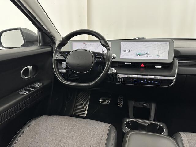 Hyundai IONIQ 5 Connect 73kWh [ 3-Fase ] {SOH-100%} (INCL-BTW) Aut *LEATHER-FABRIC | FULL-LED | DIGI-COCKPIT | AMBIENT-LIGHT | DAB | SHIFT-PADDLES | HEAD-UP | NAVI-FULLMAP | KEYLESS | CAMERA | HEATED-COMFORTSEATS | TOWBAR*