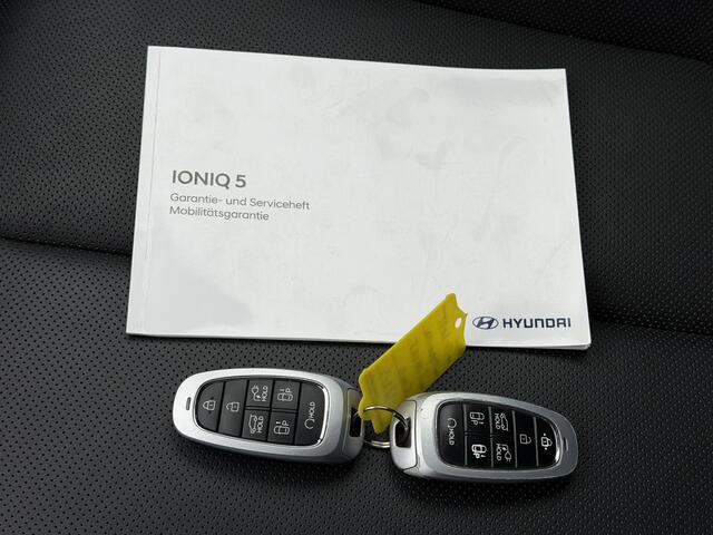 Hyundai IONIQ 5 Lounge AWD 73kWh Automaat / SOH 100% / Dealer onderhouden / Fabrieksgarantie tot 12-2026 / 8 jaar batterij garantie / Warmte Pomp / 360 Camera / BOSE / HUD / Navigatie / Elektr. Stoelen + Memory / Stoelverwarming / Stoelventilatie / Adaptieve cruise /